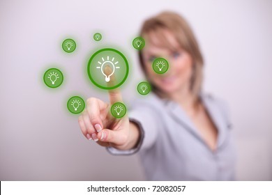 Woman pressing idea button with one hand