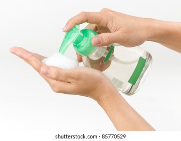 Woman Pressing The Liquid Soap To Her Hand