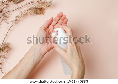 Dispensing skincare product during morning routine