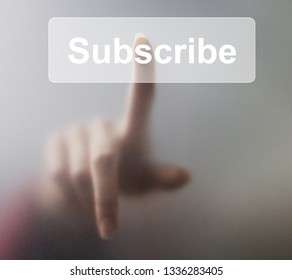 Woman pressing Subscribe button on grey background. - Powered by Shutterstock