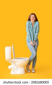Woman with problem of frequent urination on color background. Diabetes symptoms