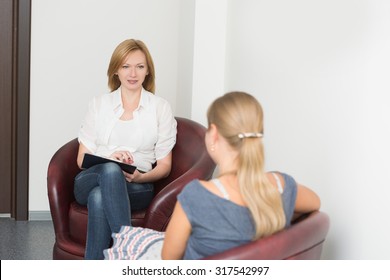 Woman with problem on reception for psychologist