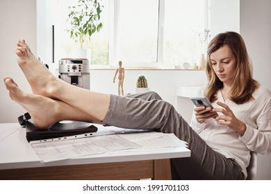 Woman procrastinate ar remote work. Freelancer use smartphone at home office. Unproductive office worker