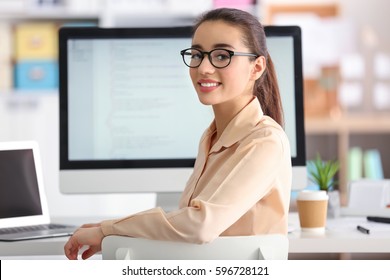 Woman Programmer Working At Office