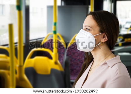 Woman In Public Bus Transport With FFP2 Face Mask