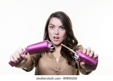 Woman Pulling A Christmas Cracker All Alone