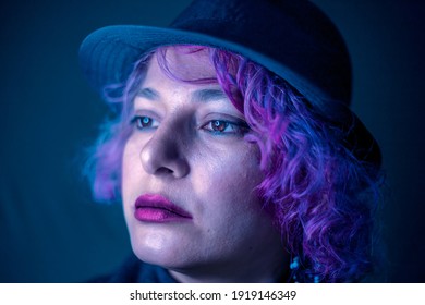 Woman With Purple Hair Fedora Hat Looking Sad