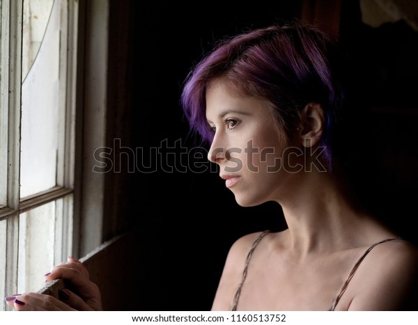 Woman Purple Hair Looking Out Window Stock Photo Edit Now 1160513752