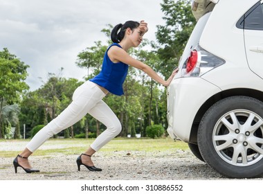 Woman Push The Car. Was Broken On The Side