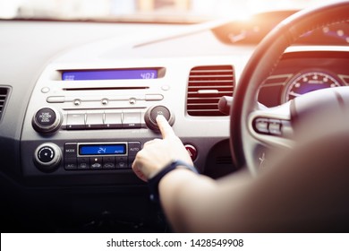 Woman Push Turn On Music Radio In Car