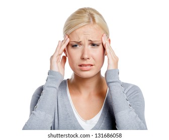 Woman puts hands on the head, isolated on white. Concept of problems and headache