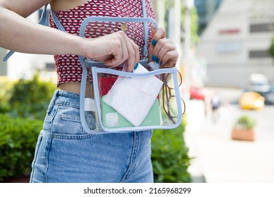 Woman Puts Sanitary Pad In Her Bag