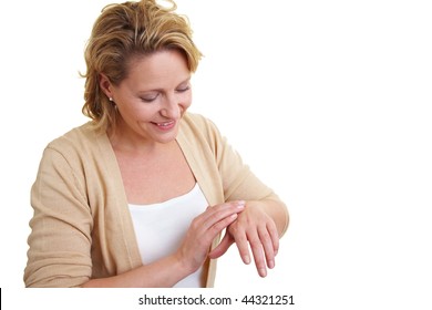 Woman Putting Hand Lotion On Her Hands