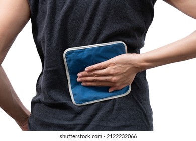 Woman Putting An Ice Pack On Her Back Pain On White Background, Healthy Concept