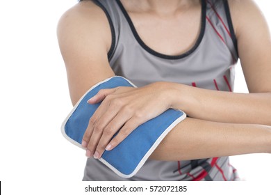 Woman Putting An Ice Pack On Her Elbow Pain