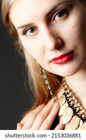 Woman Putting On Diamond Earrings. Caucasian Beauty Lady Trying And Shopping Jewelry. 