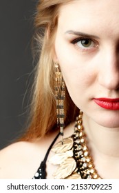 Woman Putting On Diamond Earrings. Caucasian Beauty Lady Trying And Shopping Jewelry. 