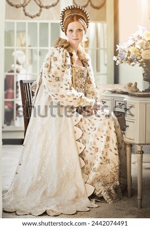 Woman, queen in portrait and royalty in luxury, renaissance aesthetic and wealth with cosplay, regal and history. Monarch, elegant dress or costume with Shakespeare, vintage or medieval in palace