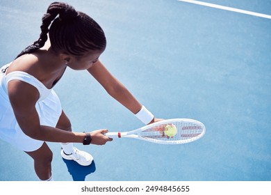 Woman, racket and tennis ball or serving in court, fitness and training in summer exercise with equipment. Energy, match and competition challenge, active and practice for sport game or workout - Powered by Shutterstock