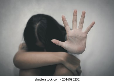Woman raised her hand for stop violence against women. - Shutterstock ID 2016095252