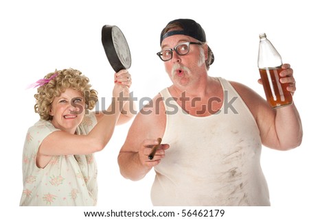 Woman readies a pan to drunken husband's head
