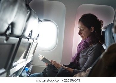 5,915 Reading on airplane Images, Stock Photos & Vectors | Shutterstock