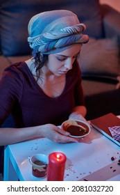 Woman Reading Her Fortune During The Tasseography Procedure