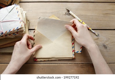 Woman reading letter from the past