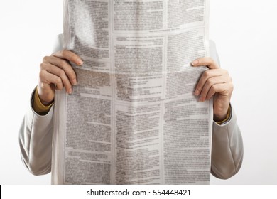 Woman Reading Newspaper On White Background