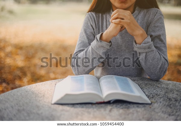 Woman Reading Praying Over Bible Stock Photo 1059454400 | Shutterstock