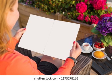 Woman Reading Sample Magazine, Empty Mockup For Your Own Design.