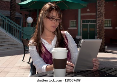 Woman Reading Tablet