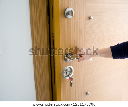 Woman Ready Looking Through Door Gap Stock Photo Edit Now