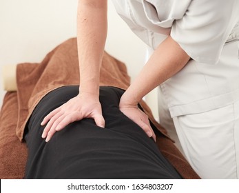 Woman receiving a massage at a Japanese manipulative institute - Shutterstock ID 1634803207