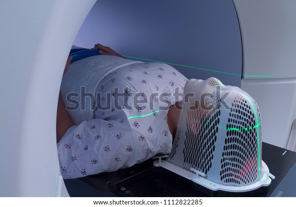 Woman Receiving Radiation Therapy Medical Treatment for\
Cancer 