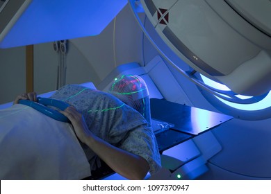 Woman Receiving Radiation Therapy Treatments For Brain Tumor