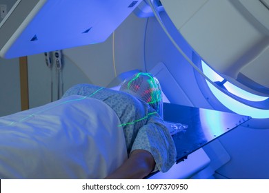 Woman Receiving Radiation Therapy Treatments For Brain Tumor