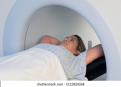 Woman Receiving Radiation Therapy Treatments For Breast Cancer
