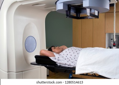 Woman Receiving Radiation Therapy Treatments For Lung Cancer