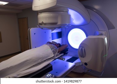 Woman Receiving Radiotherapy For Breast Cancer