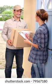 Woman receiving shipment at home