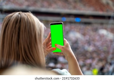 Woman Records Vertical Green Screen Video With Mobile Smart Phone Of Concert Stage. Taking Photo On Front Stage On Summer Outdoor Music Concert Festival. Online Internet Concept Communication App