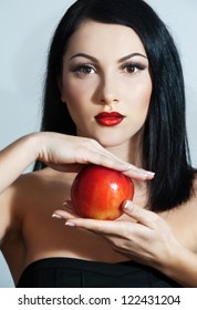 woman with red apple. snow white