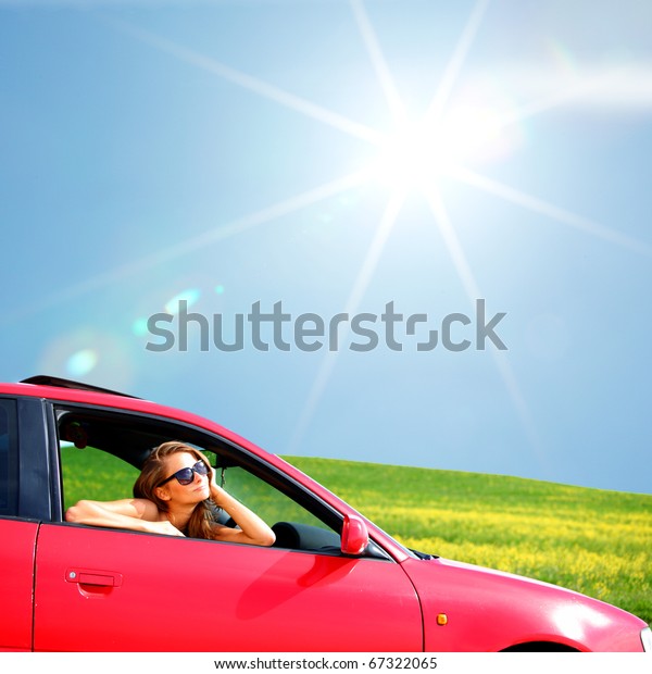 woman in red\
car