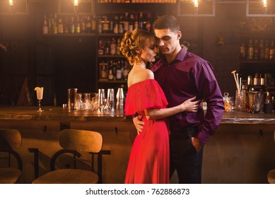 https://image.shutterstock.com/image-photo/woman-red-dress-hugs-her-260nw-762886873.jpg