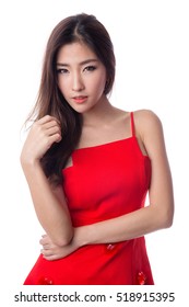 Woman in red dress isolated on white background