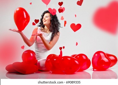 Woman With Red Heart Balloon On A White Background