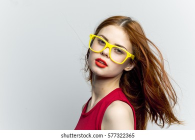 Woman with red lips, red-haired woman, white background
