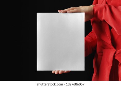 Woman In Red Presenting A Book Mockup.