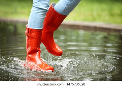 11,150 Woman rain boots Images, Stock Photos & Vectors | Shutterstock